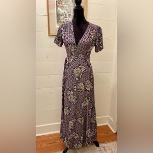 The Odells, Dress Size S featuring a wrap-style design with a deep V-neckline.